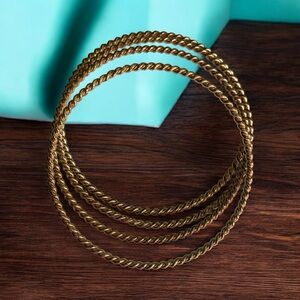 Set of 4 Gold Twisted Bangle Bracelets